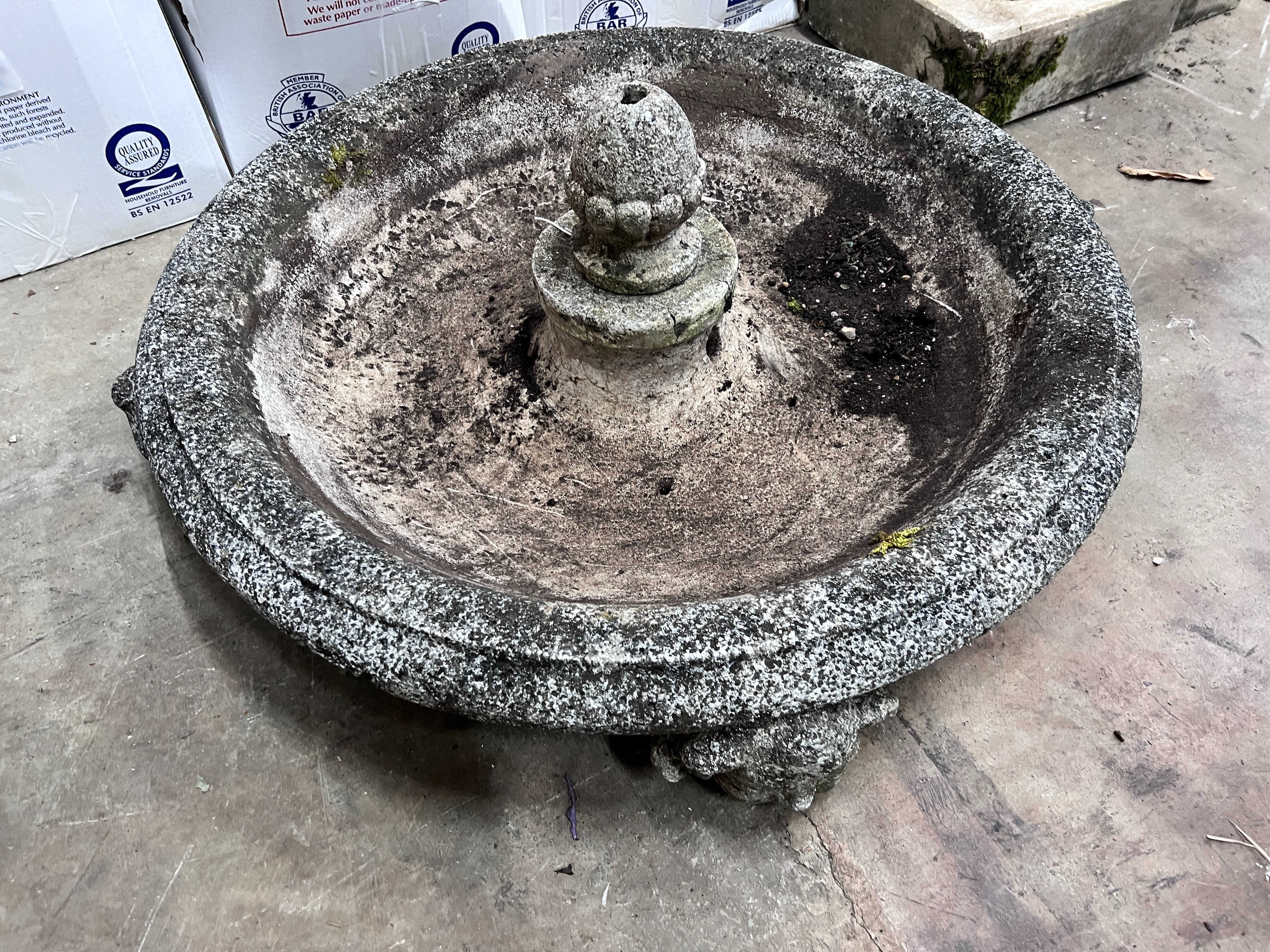 A reconstituted stone garden fountain with associated pedestal, width 76cm *Please note the sale commences at 9am.